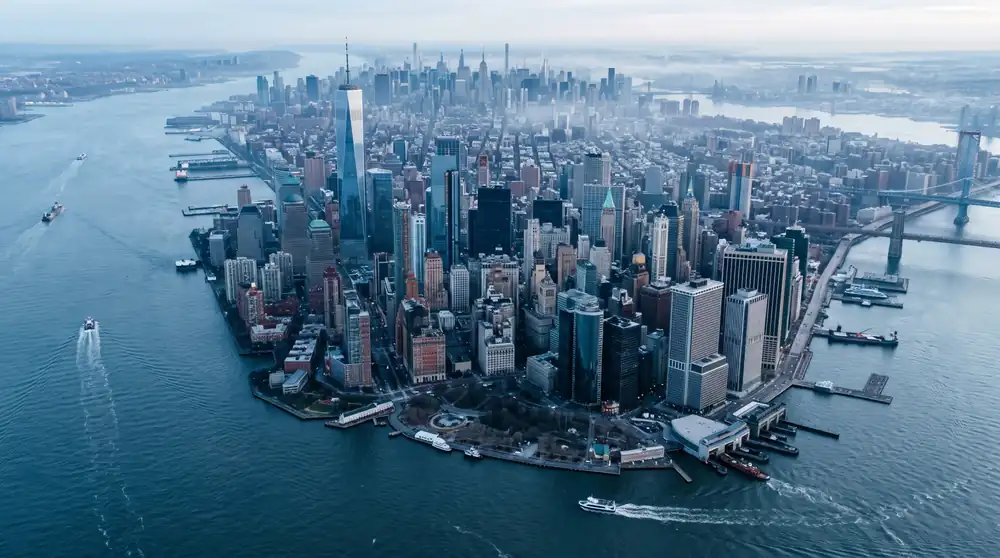 Aerial view of lower Manhattan, One World Trade Center and East River bridges